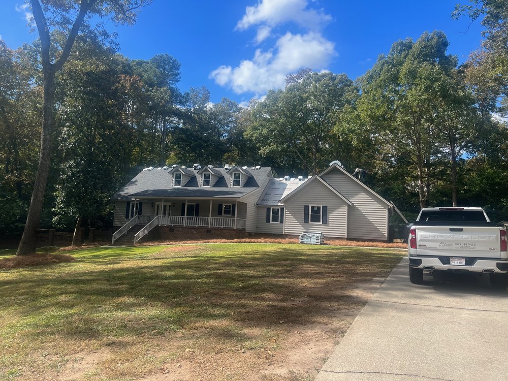 Slide of RCS Roofing