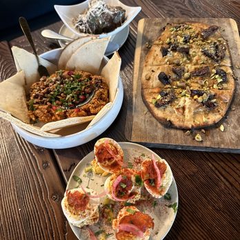 Cafe Largesse - From the bottom of my deviled eggs, fig and blue cheese coca, meatballs, muhammara. - Cafes Near Me - Sunset Valley, Texas Cafe Largesse - From the bottom of my deviled eggs, fig and blue cheese coca, meatballs, muhammara. - Cafes Near Me - Sunset Valley, Texas