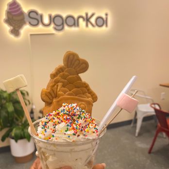 Sugar Koi - My two scoops of Banana Pudding with sprinkles, marshmallows and a Koi waffle. The waffle was warm and just as delicious as it smelled. - Ice Cream & Frozen Yogurt Near Me - Cary, North Carolina