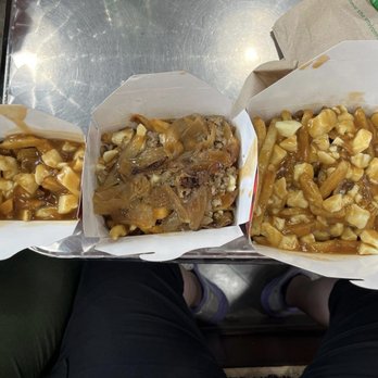 Smoke's Poutinerie - For a size comparison, my "wow" size is on the right. I could only eat half of it! - Fast Food Near Me - Niagara Falls, Ontario Smoke's Poutinerie - For a size comparison, my "wow" size is on the right. I could only eat half of it! - Fast Food Near Me - Niagara Falls, Ontario