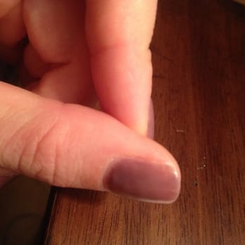 Dunkirk Nails & Day spa - Uneven color- and no color at top left tip. - Day Spas Near Me - Dunkirk, Maryland
