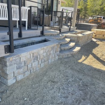 Grand Design Landscape - Freestanding hardscape steps and planters tying the deck to the future pool deck - Landscaping Near Me - Sparks, Nevada