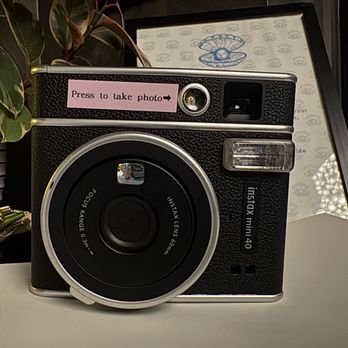 Call Me Pearl - Guests can take photos with this polaroid camera and glue them on the guestbook! What an idea!! - Cocktail Bars Near Me - Denver, Colorado