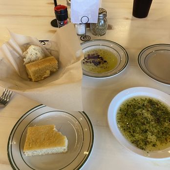 Mandolas Italian Kitchen - Jacksonville - Complimentary focaccia with dipping sauce - Italian Near Me - Jacksonville, Florida Mandolas Italian Kitchen - Jacksonville - Complimentary focaccia with dipping sauce - Italian Near Me - Jacksonville, Florida