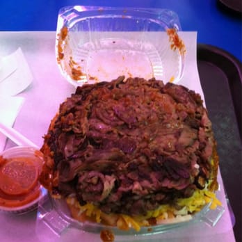 Tam's Burgers - This is a small chili cheese fries with carne...yea, a small. Seriously. - Burgers Near Me - Paramount, California Tam's Burgers - This is a small chili cheese fries with carne...yea, a small. Seriously. - Burgers Near Me - Paramount, California
