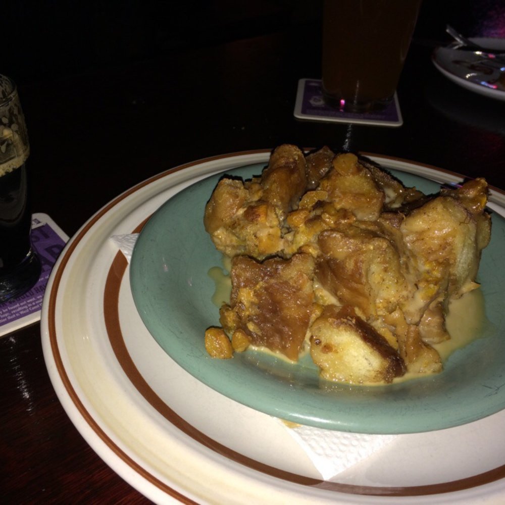 Keg Cowboy - Peach pretzel bread pudding with a Seminar Peanut Butter Carver Porter sauce and a 5 oz Brooklyn Black Chocolate Stout - Bars Near Me - Lexington, South Carolina