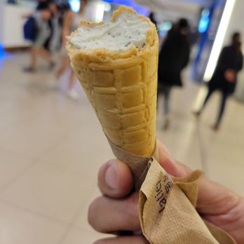 Purdys Chocolatier - a person holding an ice cream cone - Chocolatiers & Shops Near Me - Toronto, Ontario