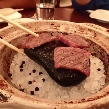 Uchi Dallas - Wagyu beef cooking on hot rock - Japanese Near Me - Dallas, Texas