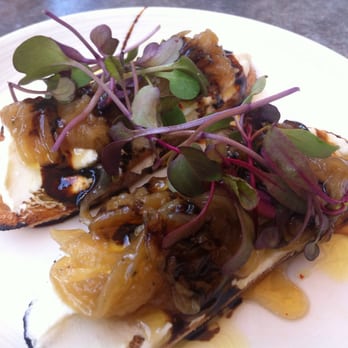Bravas Bar de Tapas - Goat Cheese Toast (Golden Onions, White Truffle Honey, $6) - Spanish Near Me - Healdsburg, California Bravas Bar de Tapas - Goat Cheese Toast (Golden Onions, White Truffle Honey, $6) - Spanish Near Me - Healdsburg, California