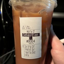 Dunkin' - medium iced coffee with milk, 1 pump of pink velvet swirl, & 1 shot of vanilla