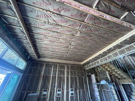 Fiberglass Batts - Fiberglass batts that we install for insulation in this home!