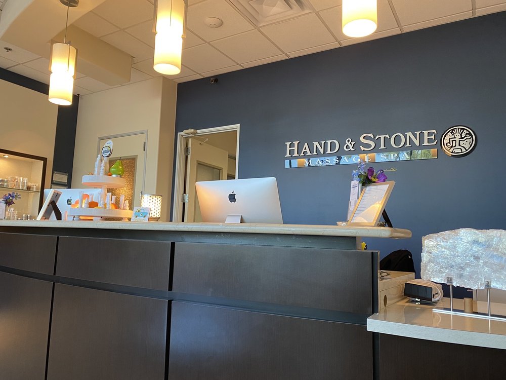 Hand & Stone Massage and Facial Spa Logo