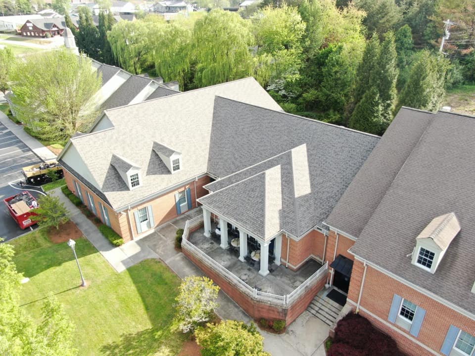 Slide of AMI Roofing