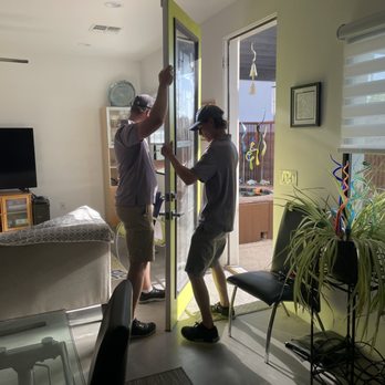 Artistic Entry Transformations - The door comes in and the brothers lift it up onto the hinges. - Door Sales/Installation Near Me