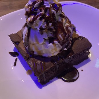 Yard House - Brookie: chocolate cookie dough topped with vanilla ice cream - New American Near Me - Bakersfield, California