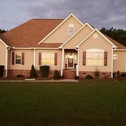 Streamline Seamless Gutters - White 6" seamless gutter with 3x4 downspouts.