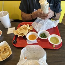 Alfredo's Mexican Food - Carne asada burrito. Chips and salsa.