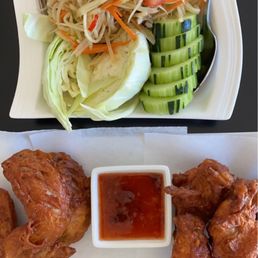 Papaya Salad and chicken wings Papaya Salad and chicken wings
