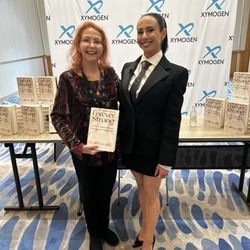 Boca Wellness & Nutrition Services - Paula at conference book signing