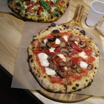 Pizza Rox - First half is margarita pizza... Second half is pesto with roasted tomatoes. Closest one is mushroom & fresh mozzarella. ALL FANTASTIC - Pizza Near Me - Boynton Beach, Florida Pizza Rox - First half is margarita pizza... Second half is pesto with roasted tomatoes. Closest one is mushroom & fresh mozzarella. ALL FANTASTIC - Pizza Near Me - Boynton Beach, Florida