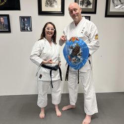 Lonsdale Karate - Tim and Jennifer showing the tinbe that she painted.