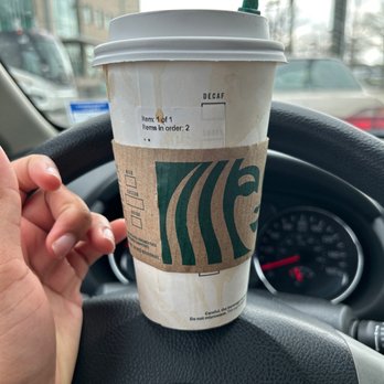 Starbucks - a cup of coffee on a steering wheel - Coffee & Tea Near Me - New Orleans, Louisiana Starbucks - a cup of coffee on a steering wheel - Coffee & Tea Near Me - New Orleans, Louisiana