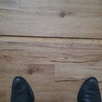 My Handy Craftsman - a person standing on a hard wood floor - Handyman Near Me - Winter Park, Florida My Handy Craftsman - a person standing on a hard wood floor - Handyman Near Me - Winter Park, Florida