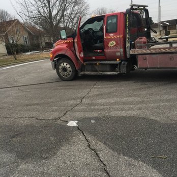 Affordable Towing - Two wreckers one torn up yard - Towing Near Me - Springfield, Missouri