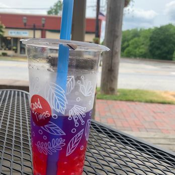 Grand Pacific Popcorn & Sweets - a drink in a plastic cup with a blue straw - Popcorn Shops Near Me - Olmsted Falls, Ohio Grand Pacific Popcorn & Sweets - a drink in a plastic cup with a blue straw - Popcorn Shops Near Me - Olmsted Falls, Ohio