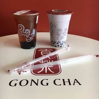 Gong Cha - On the right, we have taro milk with pearl bubbles at 50% sugar and little ice. Hand shaken with a machine to seal the top. - Bubble Tea Near Me - Edison, New Jersey