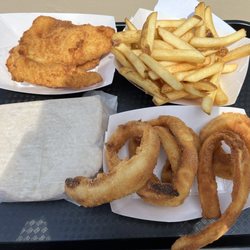 The Fishery - Two Piece Fish Sandwich on Rye Bread with Fries and Onion Rings