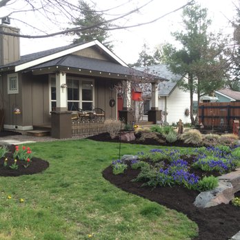 The Garden Specialists - A top dressing of compost in spring is great for the plants, and looks great too! - Landscaping Near Me The Garden Specialists - A top dressing of compost in spring is great for the plants, and looks great too! - Landscaping Near Me