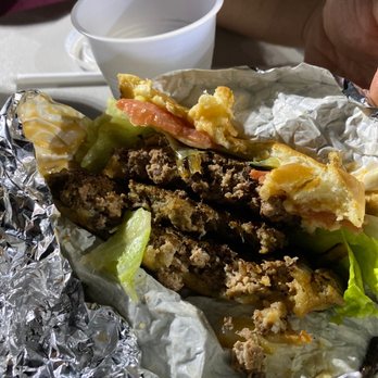 Halal House - The Double Gyro Burger half eatened - Mediterranean Near Me - Northridge, California