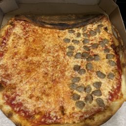 I always appreciate extra, but extra pizza is never good when it is folded into the box to fit.
