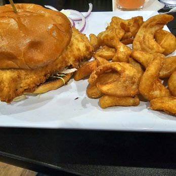 The Getaway Grille and Bar - Grouper sandwich and fries - Chicken Wings Near Me - Tallahassee, Florida The Getaway Grille and Bar - Grouper sandwich and fries - Chicken Wings Near Me - Tallahassee, Florida