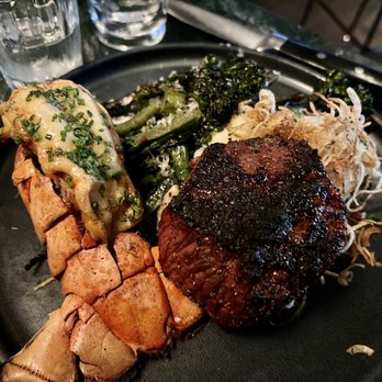 Earls Kitchen + Bar - Surf and turf. Lobster was already cut to bite sized abs steak was nicely cooked. Broccolini was too charred. - New American Near Me - Boston, Massachusetts Earls Kitchen + Bar - Surf and turf. Lobster was already cut to bite sized abs steak was nicely cooked. Broccolini was too charred. - New American Near Me - Boston, Massachusetts