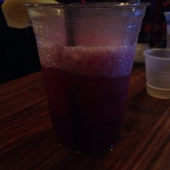 Fishbones Bar & Grille - Vodka Drink - Blueberry flavoring with too much ice. In a plastic cup. Hmm..hoping meal doesn't come on paper plates.. - Seafood Near Me - Oak Bluffs, Massachusetts Fishbones Bar & Grille - Vodka Drink - Blueberry flavoring with too much ice. In a plastic cup. Hmm..hoping meal doesn't come on paper plates.. - Seafood Near Me - Oak Bluffs, Massachusetts