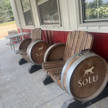 Solu Estate Winery & Meadery - Cute Solu chairs on the front patio made of wine barrels - Wineries Near Me - Cascade, Wisconsin Solu Estate Winery & Meadery - Cute Solu chairs on the front patio made of wine barrels - Wineries Near Me - Cascade, Wisconsin