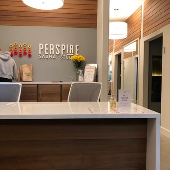 Perspire Sauna Studio - Costa Mesa - The logo behind the front desk - Saunas Near Me - Costa Mesa, California Perspire Sauna Studio - Costa Mesa - The logo behind the front desk - Saunas Near Me - Costa Mesa, California