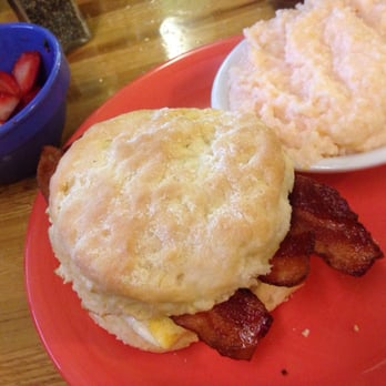 Stack'em High Pancakes & So Forth - Monster Biscuit Sandwich with cheesy grits & fresh strawberries - Pancakes Near Me - Kill Devil Hills, North Carolina
