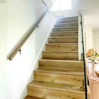 LA Railings - This recent installation showcases how the right glass railing can elevate a staircase into a true interior feature. Minimalist, secure, and - Decks & Railing Near Me - Los Angeles, California LA Railings - This recent installation showcases how the right glass railing can elevate a staircase into a true interior feature. Minimalist, secure, and - Decks & Railing Near Me - Los Angeles, California