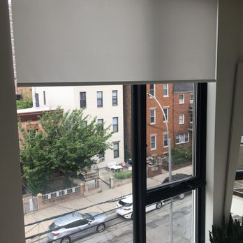 Blinds, Shades, Glass & More - motorized shade in the bedroom (allows 1% light in) - Shades & Blinds Near Me - LIC, New York Blinds, Shades, Glass & More - motorized shade in the bedroom (allows 1% light in) - Shades & Blinds Near Me - LIC, New York