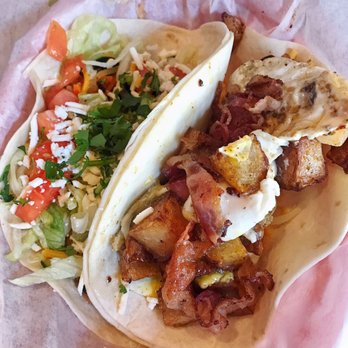 Fuzzy's Taco Shop - Veggie taco (not what I ordered) and the bacon, egg & potato taco - Tex-Mex Near Me - Orlando, Florida Fuzzy's Taco Shop - Veggie taco (not what I ordered) and the bacon, egg & potato taco - Tex-Mex Near Me - Orlando, Florida