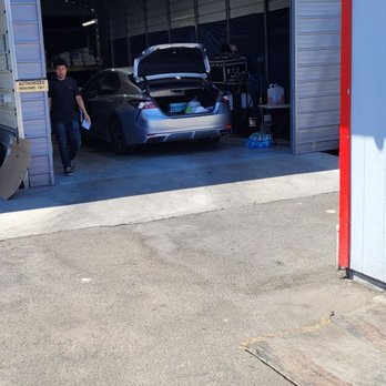 Low Cost Auto Glass - They close the door when applying the tint - Car Window Tinting Near Me - Sacramento, California Low Cost Auto Glass - They close the door when applying the tint - Car Window Tinting Near Me - Sacramento, California
