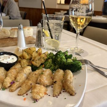 Audie's Restaurant - Yellow perch and Yukon gold potatoes with broccoli. Chardonnay for the win. - American Near Me - Mackinaw City, Michigan Audie's Restaurant - Yellow perch and Yukon gold potatoes with broccoli. Chardonnay for the win. - American Near Me - Mackinaw City, Michigan