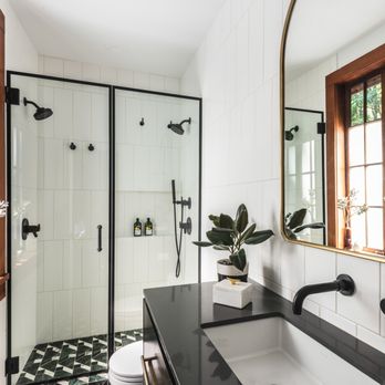 Atelier Drome - Classic black and white primary bath with bold pattern tile - Architects Near Me - Seattle, Washington