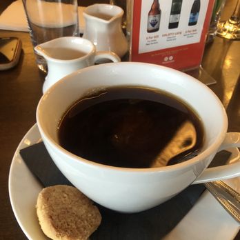 Tru Astoria - Coffee served with a biscuit - Mediterranean Near Me - Astoria, New York Tru Astoria - Coffee served with a biscuit - Mediterranean Near Me - Astoria, New York