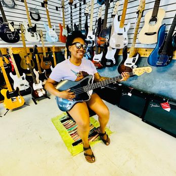 The Guitar Nook - Me & my new bass guitar - Guitar Stores Near Me - North Miami Beach, Florida The Guitar Nook - Me & my new bass guitar - Guitar Stores Near Me - North Miami Beach, Florida