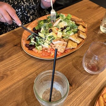 Rusted Roost Restaurant & Bar - Caesar Salad with chicken - Bars Near Me - Menasha, Wisconsin