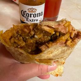 Chili Verde burrito. No veggies and no cheese. Sooo good. Chili Verde burrito. No veggies and no cheese. Sooo good.